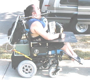 Artisan built custom power chair with ventilator custom leg tray and chin control